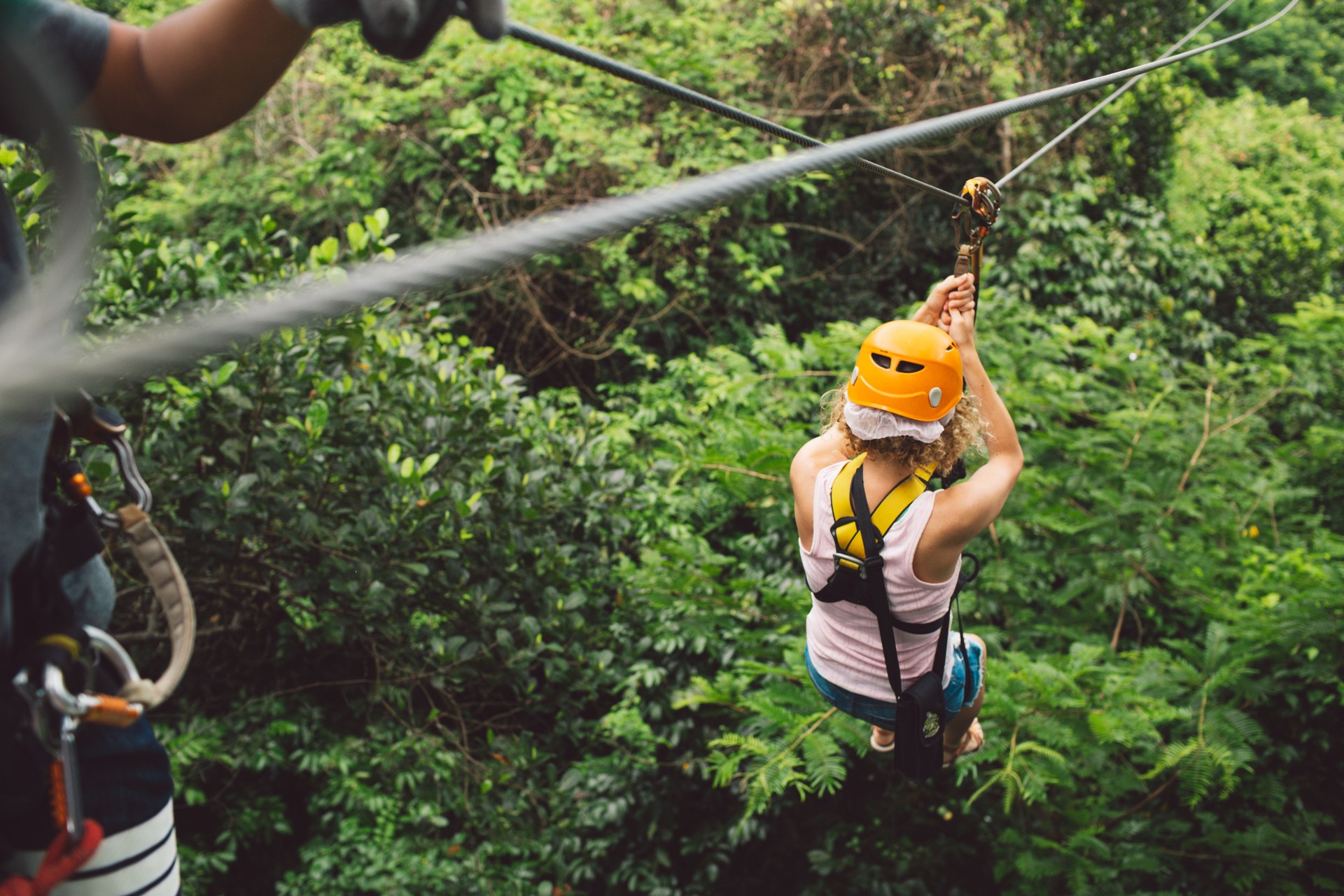 High Angle View Of Woman Ziplining In Antigua